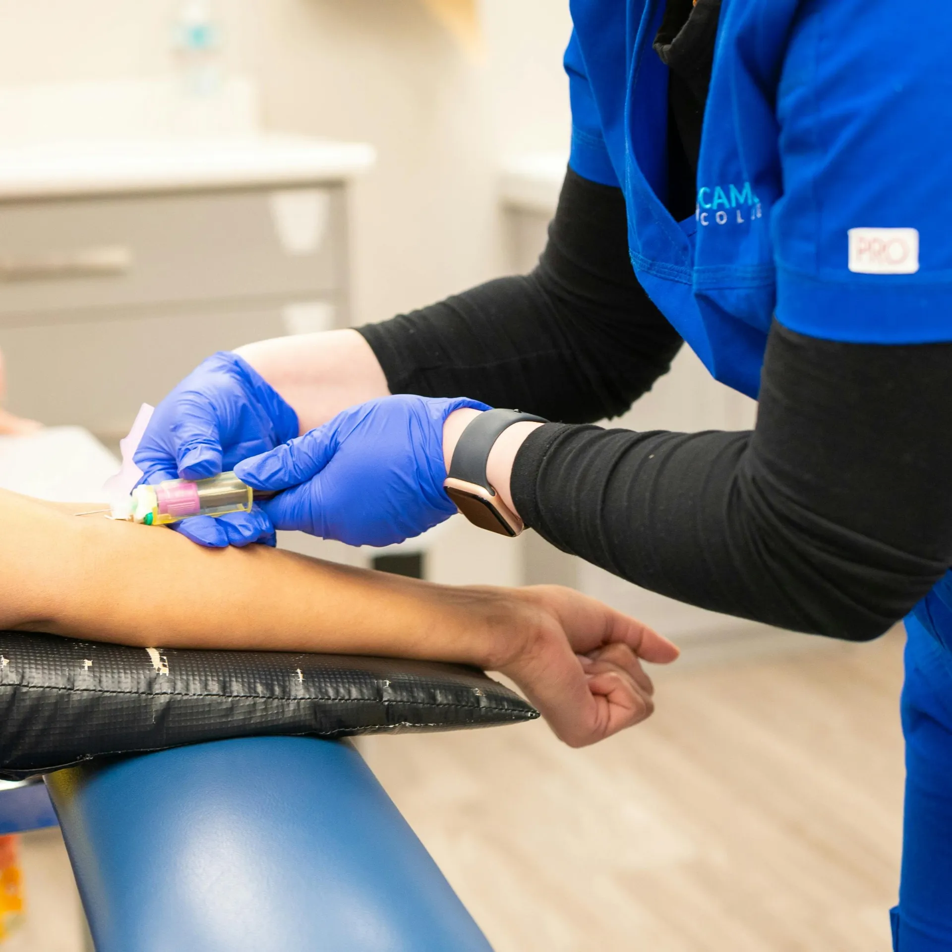 Blood draw for Early Cancer Screening in a clean medical clinic setting.