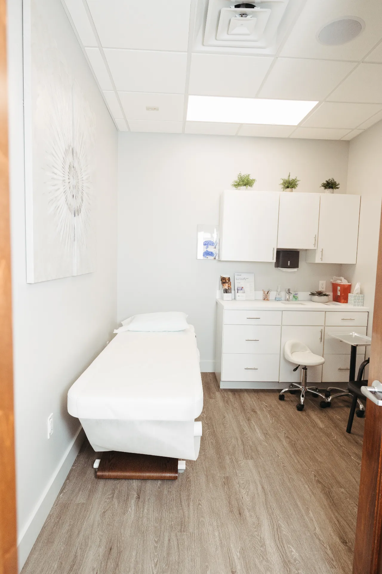 Private F-Shot treatment room prepared for consultation and care at Encompass Wellness & Aesthetics
